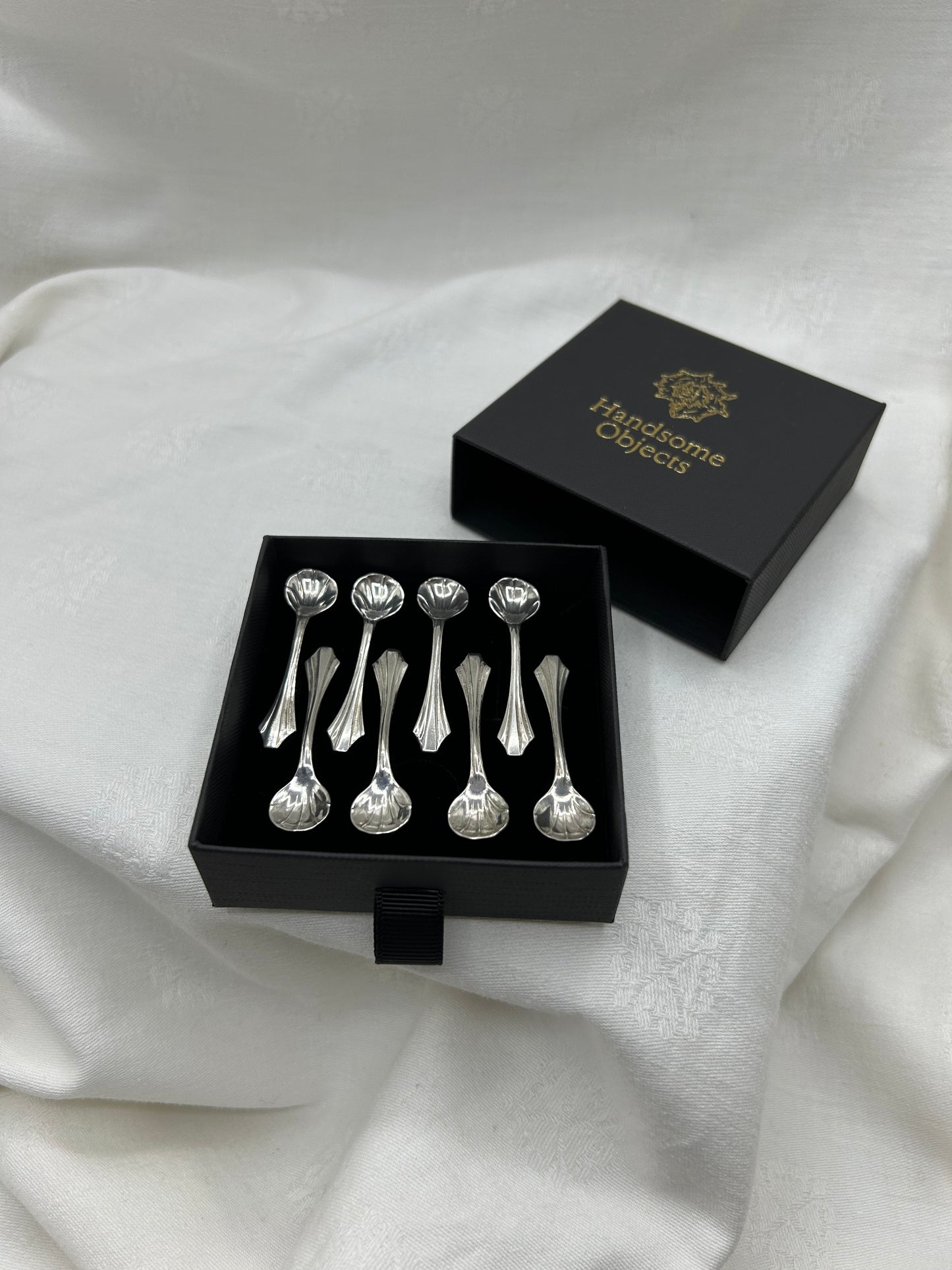 Eight Sterling Silver Salt Spoons
